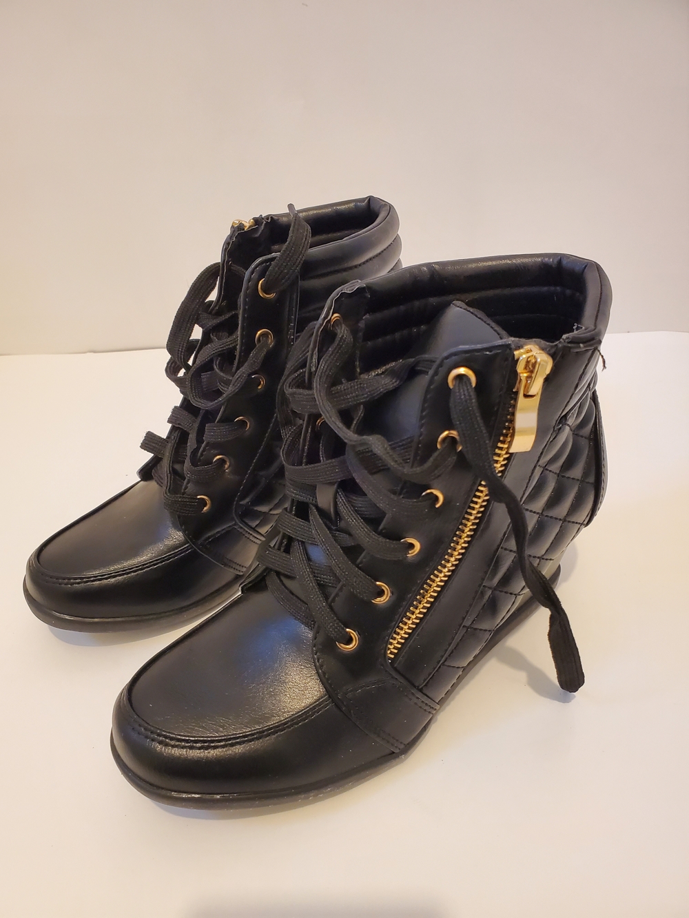 Black Quilted Lace-Up Wedge Sneakers with Gold Zipper